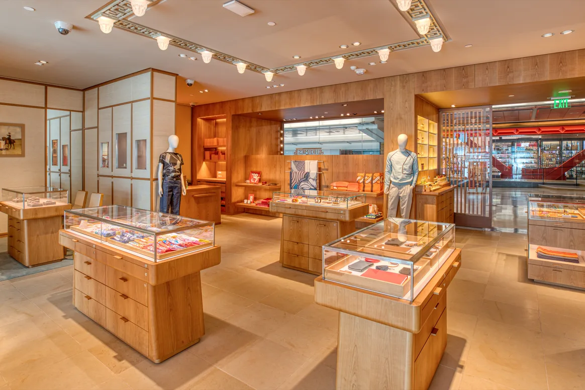 Display of leather goods and clothing at Hermes, SFO