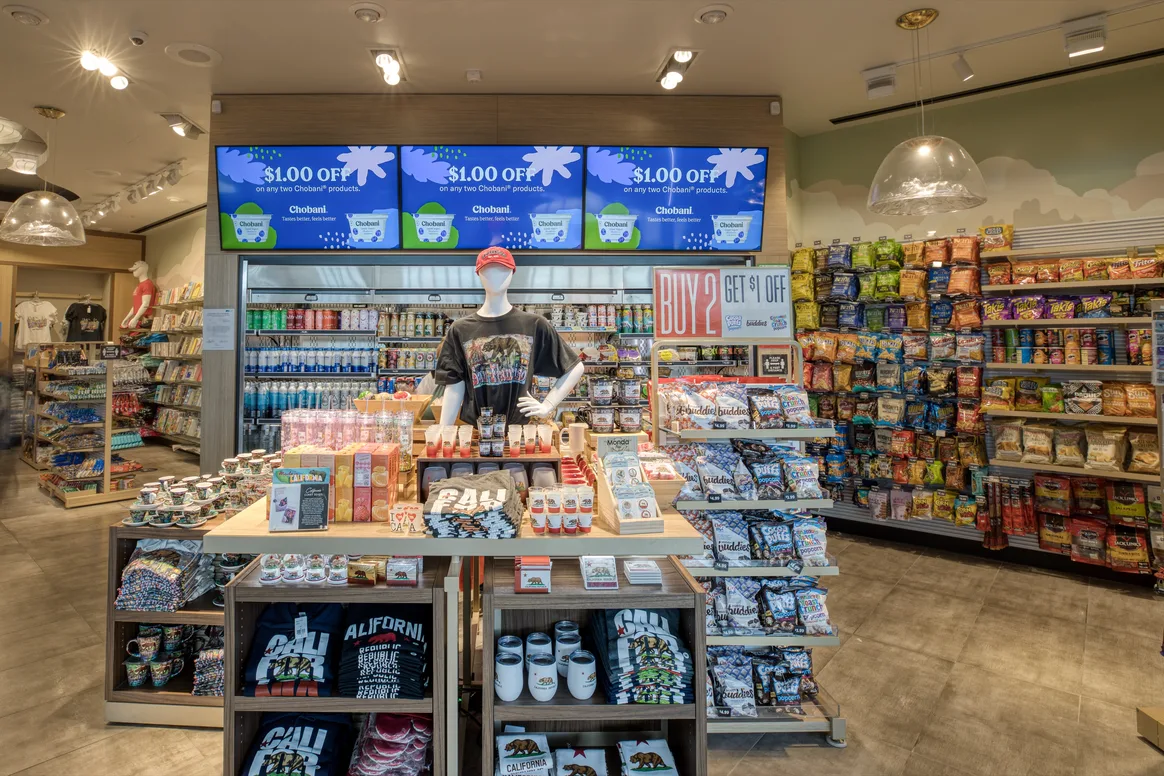 Clothing and snack display at Departures store