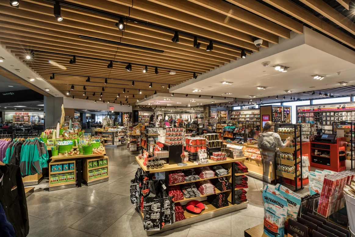 Customer browses souvenirs for sale at District Market